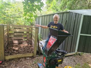 Rush Coffee Head Roaster, Hayden, taking time to mulch and compost his customers' used Econic packs.
